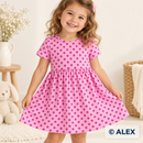 Berry Polka Dots on Pink Cotton Jersey Fabric made into a children's dress