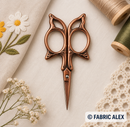 Bronze embroidery scissors in use - Fabric Alex