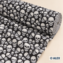 White Skulls on Black Cotton Fabric — fabric detail