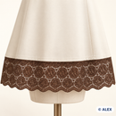 Brown rose medallion elastic lace used as a dress hem
