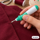Ergonomic seam ripper removing a stitch