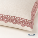 Dusty pink eyelet scallop Brussels lace used on an ivory linen cushion