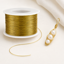 Gold jewellery wire 0.5 mm shown in a wire-wrapped jewellery example