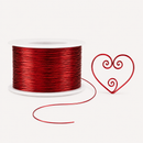 Red jewellery wire 0.5 mm shown in a decorative wire heart example