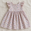 Toddler dress sewing idea using pale pink butterfly organic cotton fabric
