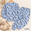 Playful Sheep on Pale Blue Cotton Jersey Fabric made into children's pyjamas