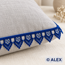 Blue pointed fan edge Brussels lace used on a linen cushion