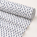 Navy dolphins on white printed polycotton fabric