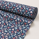 Pastel butterflies on navy printed polycotton fabric