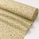 Pink floral on sage printed polycotton fabric