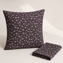 Purple floral on black polycotton fabric cushion example