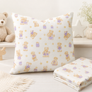 Teddy bear and cookie polycotton fabric shown as a nursery cushion