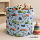 Colourful trains on light blue polycotton fabric toy basket example © Fabric Alex