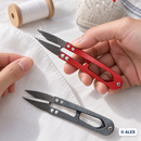 Red thread snips in use with grey colour option shown