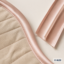 Satin bias binding sewn around a curved fabric edge