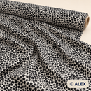 Black Animal Spots on White Viscose Fabric — fabric detail