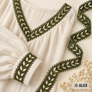 Green woven leaf Brussels lace used on an ivory linen blouse