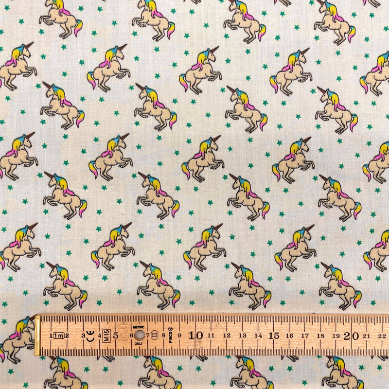 Unicorns Cream Polycotton Fabric | Width - 115cm/45inch - Shop Fabrics, Cushions & Dressmaking Supplies online - Fabric Family