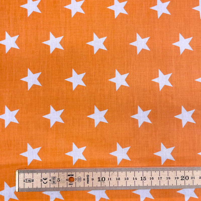 Stars Orange Polycotton Fabric | Width - 115cm/45inch - Shop Fabrics, Cushions & Dressmaking Supplies online - Fabric Family